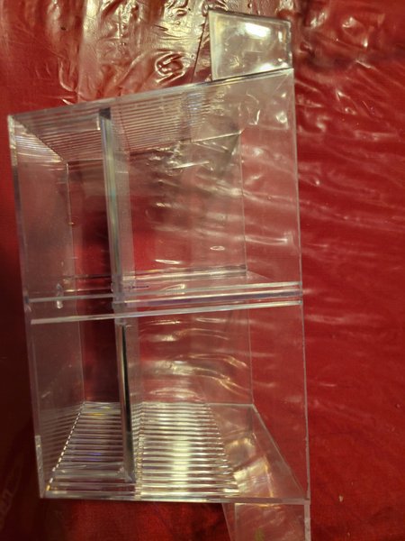 Floating breeder box with slits in sides