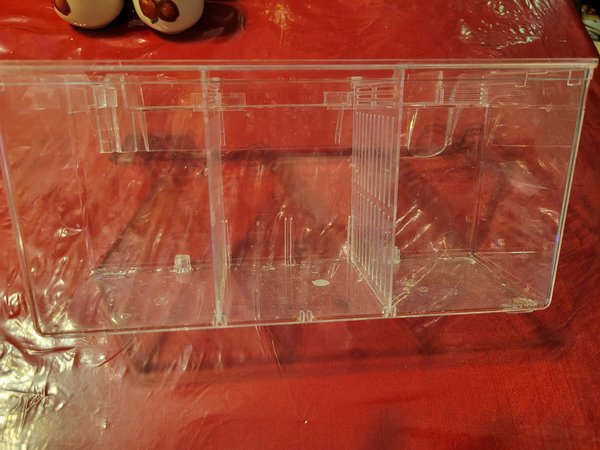 Part of fluval breeder box- large