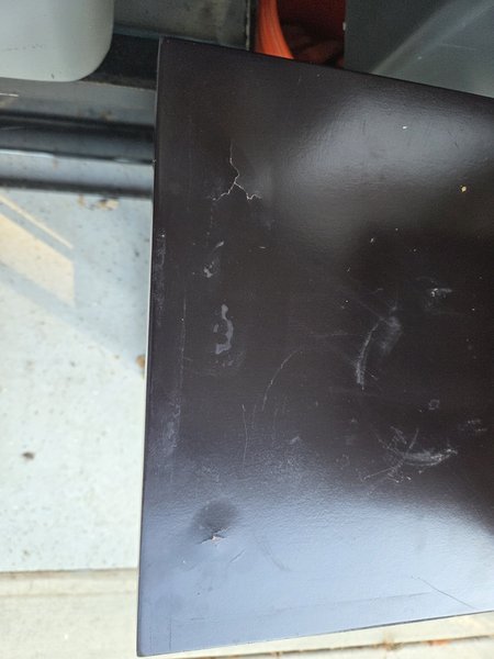 slight damage to top of stand